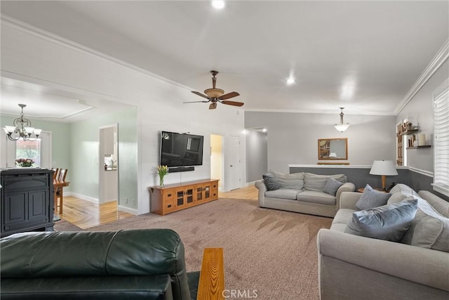 40 Gunter Ln, Oroville, CA 95966 - carpeted living room featuring ornamental molding, a chandelier, ceiling fan, and baseboards