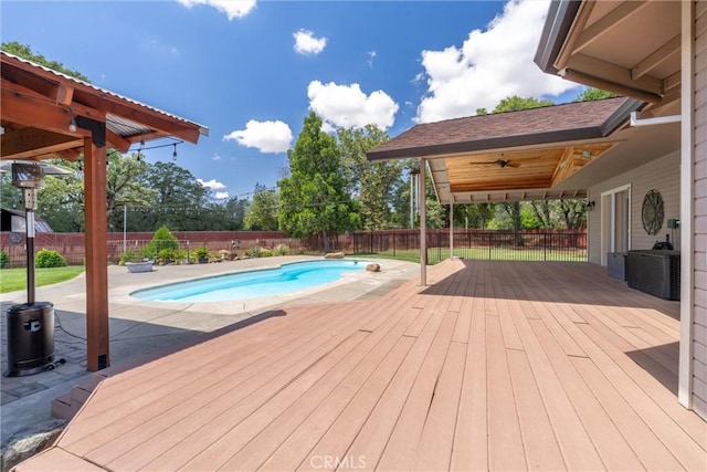 40 Gunter Ln, Oroville, CA 95966 - view of swimming pool featuring a wooden deck, a fenced backyard, and a patio area