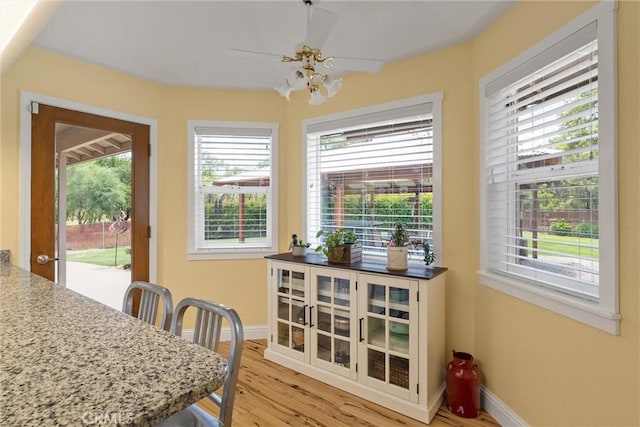 40 Gunter Ln, Oroville, CA 95966 - dining room featuring baseboards, light wood-style floors, and a ceiling fan