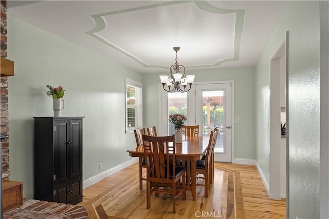 40 Gunter Ln, Oroville, CA 95966 - dining space with a chandelier, light wood-style floors, and plenty of natural light