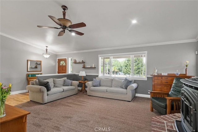 40 Gunter Ln, Oroville, CA 95966 - living room with ornamental molding, a ceiling fan, baseboards, vaulted ceiling, and a wood stove