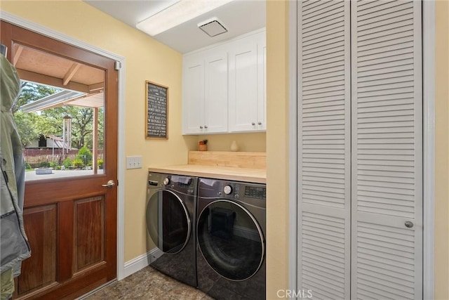 40 Gunter Ln, Oroville, CA 95966 - washroom featuring cabinet space, washing machine and clothes dryer, and baseboards