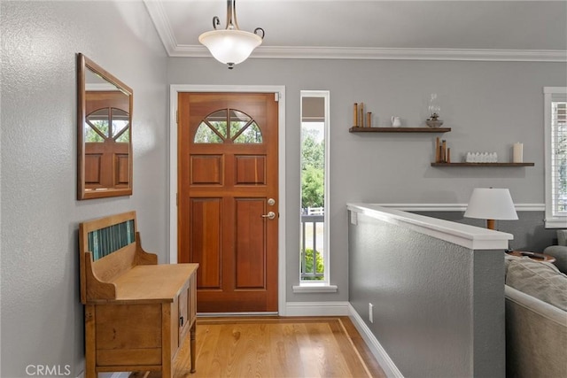 40 Gunter Ln, Oroville, CA 95966 - entrance foyer featuring light wood finished floors, crown molding, healthy amount of natural light, and baseboards