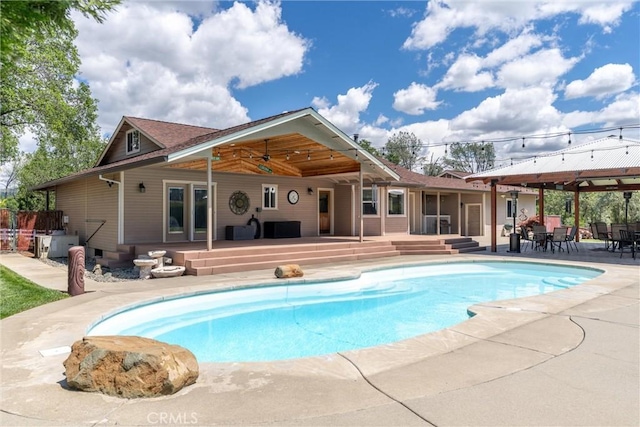 40 Gunter Ln, Oroville, CA 95966 - swimming pool with a ceiling fan, a patio area, a gazebo, outdoor dining space, and a deck