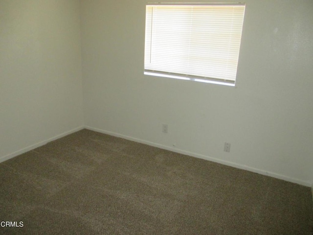 44104 Carolside Ave, Lancaster, CA 93535 - carpeted spare room with baseboards