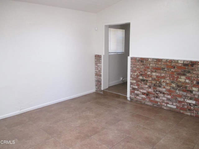 44104 Carolside Ave, Lancaster, CA 93535 - unfurnished room featuring vaulted ceiling and baseboards