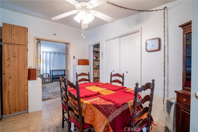 3956 Royce St, Riverside, CA 92503 - dining area featuring a ceiling fan, light tile patterned floors, and light carpet