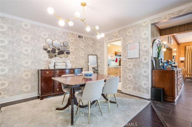 6616 Langdon Ave, Van Nuys, CA 91406 - dining space with wood-type flooring, ornamental molding, a chandelier, and baseboards