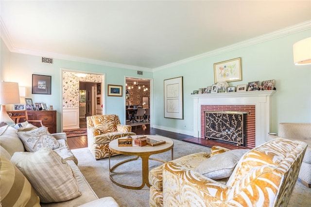 6616 Langdon Ave, Van Nuys, CA 91406 - living area with crown molding, wood finished floors, and a brick fireplace