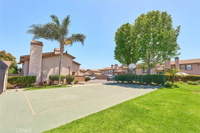 8068 Catherine Ave Unit 9, Stanton, CA 90680 - view of basketball court with community basketball court and a residential view