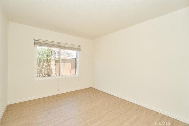 8068 Catherine Ave Unit 9, Stanton, CA 90680 - empty room with light wood finished floors and baseboards