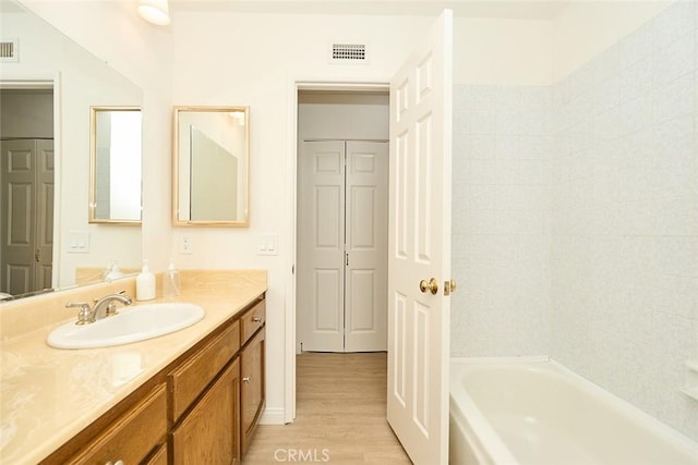 8068 Catherine Ave Unit 9, Stanton, CA 90680 - full bath featuring wood finished floors and vanity