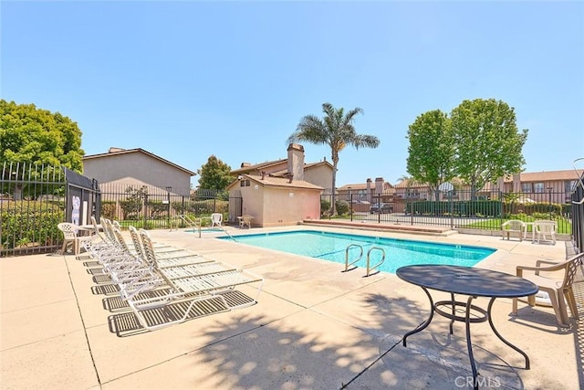 8068 Catherine Ave Unit 9, Stanton, CA 90680 - community pool featuring fence and a patio area