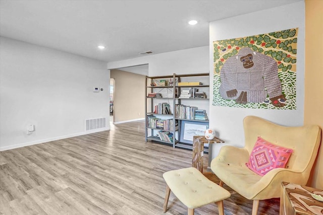 7977 Pala St, San Diego, CA 92114 - living area with wood finished floors and recessed lighting