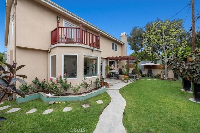 1304 Harkness St, Manhattan Beach, CA 90266 - back of property with a balcony, a pergola, stucco siding, a patio area, and a chimney