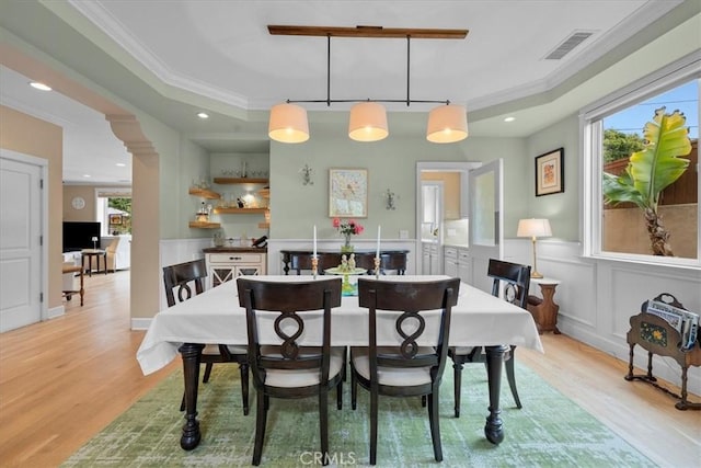 1304 Harkness St, Manhattan Beach, CA 90266 - dining space with light wood finished floors, ornamental molding, healthy amount of natural light, a wainscoted wall, and recessed lighting