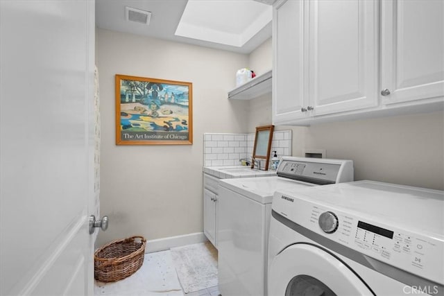 1304 Harkness St, Manhattan Beach, CA 90266 - clothes washing area featuring washer and clothes dryer, cabinet space, and baseboards