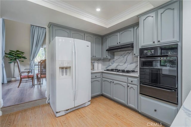 9403 Mesa Robles Dr, Whittier, CA 90603 - kitchen with white refrigerator with ice dispenser, a warming drawer, oven, gray cabinets, and crown molding
