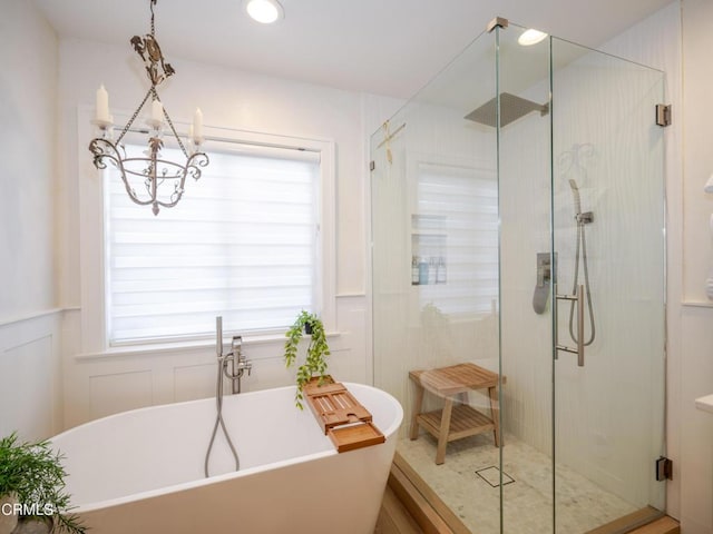 2956 Wauneta St, Newbury Park, CA 91320 - full bath featuring a chandelier, a shower stall, a decorative wall, and a freestanding bath