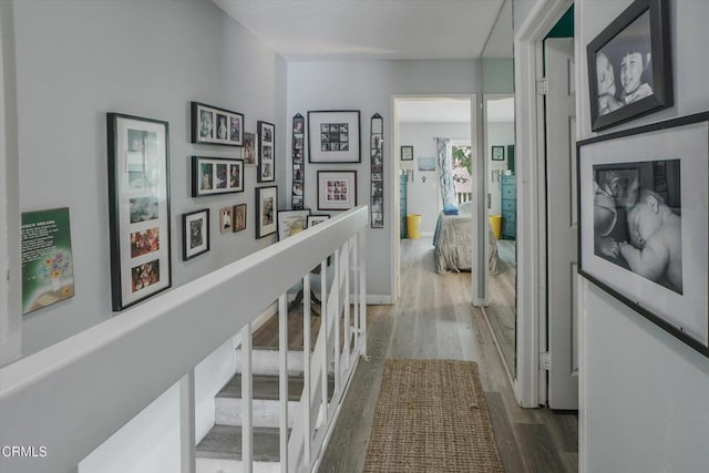hall featuring wood finished floors