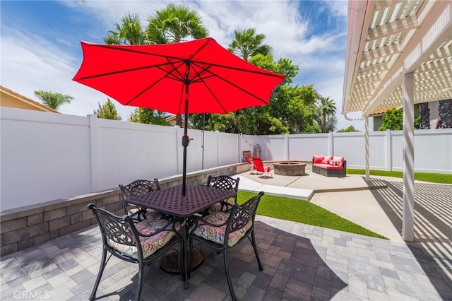 27483 Dandelion Ct, Temecula, CA 92591 - view of patio / terrace with a fire pit, a pergola, a fenced backyard, and outdoor dining area
