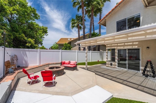 27483 Dandelion Ct, Temecula, CA 92591 - view of patio with a fenced backyard and an outdoor living space with a fire pit
