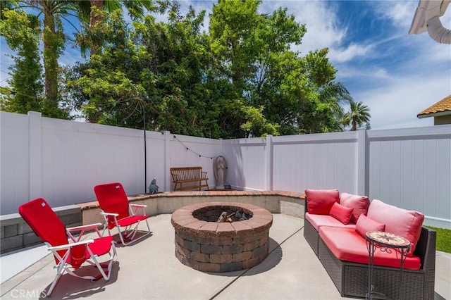 27483 Dandelion Ct, Temecula, CA 92591 - view of patio with a fenced backyard and an outdoor living space with a fire pit