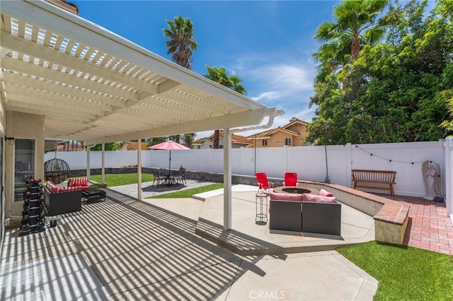 27483 Dandelion Ct, Temecula, CA 92591 - view of patio featuring an outdoor fire pit, outdoor dining area, a fenced backyard, and a gate