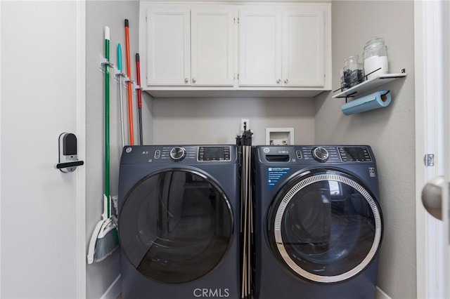 27483 Dandelion Ct, Temecula, CA 92591 - clothes washing area with washer and dryer and cabinet space