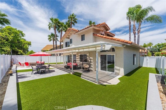 27483 Dandelion Ct, Temecula, CA 92591 - back of property with stucco siding, a patio area, a tiled roof, and an outdoor hangout area