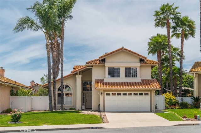 27483 Dandelion Ct, Temecula, CA 92591 - mediterranean / spanish home featuring driveway, a tile roof, an attached garage, and stucco siding