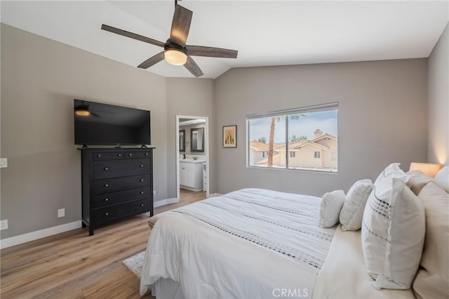 27483 Dandelion Ct, Temecula, CA 92591 - bedroom featuring light wood finished floors, baseboards, lofted ceiling, ceiling fan, and connected bathroom