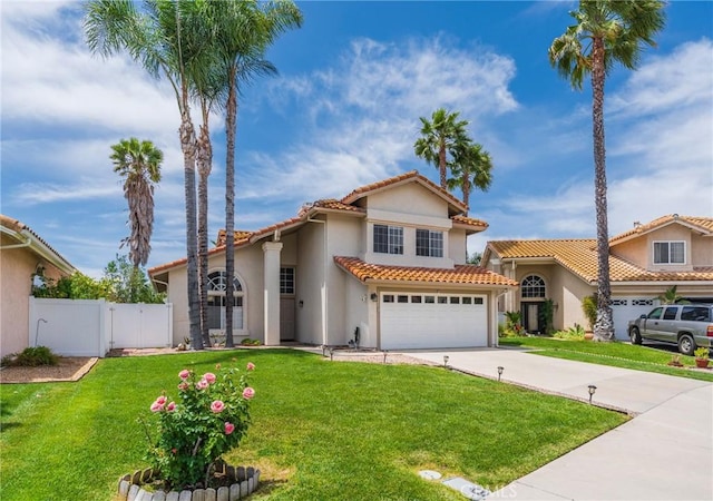 27483 Dandelion Ct, Temecula, CA 92591 - mediterranean / spanish house with concrete driveway, an attached garage, stucco siding, and a tile roof