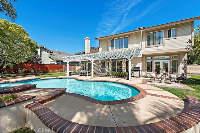28881 Via Hacienda, San Juan Capistrano, CA 92675 - back of house featuring a pergola, a patio, fence, a chimney, and french doors
