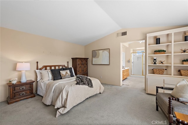28881 Via Hacienda, San Juan Capistrano, CA 92675 - bedroom featuring lofted ceiling, light colored carpet, and ensuite bathroom