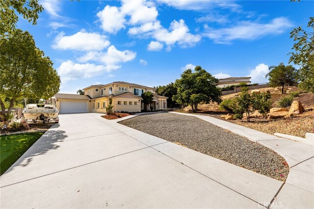 18660 Sunset Knoll Dr, Riverside, CA 92504 - view of front of house featuring concrete driveway and an attached garage