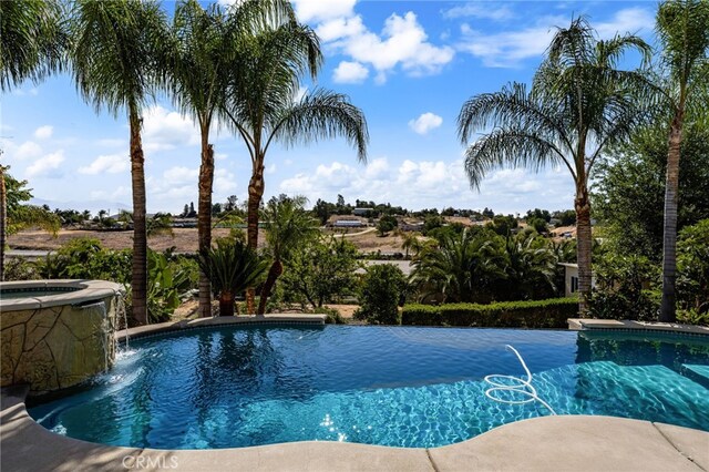 18660 Sunset Knoll Dr, Riverside, CA 92504 - view of pool with a pool with connected hot tub