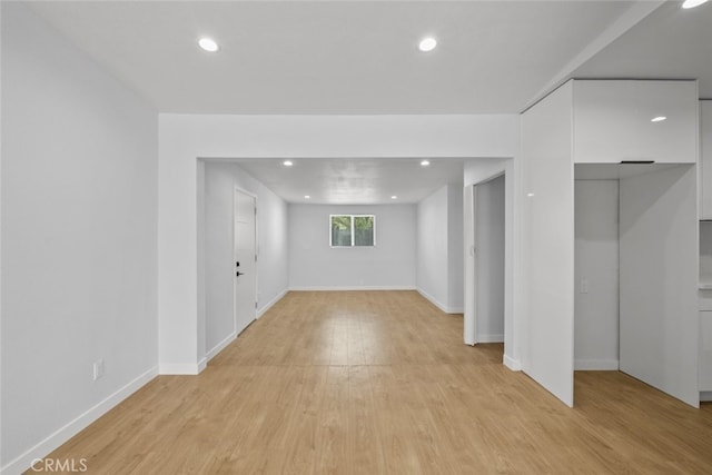 11177 Tamarack Ave, Pacoima, CA 91331 - below grade area with light wood-type flooring, recessed lighting, and baseboards