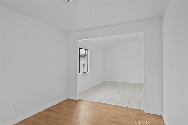 11177 Tamarack Ave, Pacoima, CA 91331 - empty room with light wood finished floors and baseboards