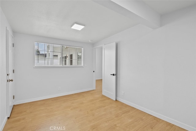 11177 Tamarack Ave, Pacoima, CA 91331 - unfurnished room with light wood-style flooring and baseboards