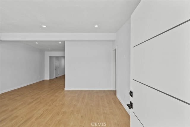 11177 Tamarack Ave, Pacoima, CA 91331 - unfurnished room with recessed lighting, light wood-type flooring, and baseboards