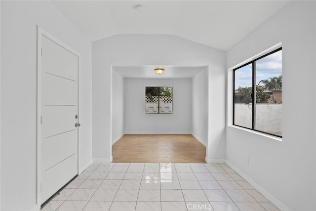 11177 Tamarack Ave, Pacoima, CA 91331 - spare room with lofted ceiling, baseboards, and a smoke detector