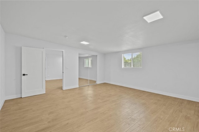 11177 Tamarack Ave, Pacoima, CA 91331 - basement with light wood finished floors and baseboards