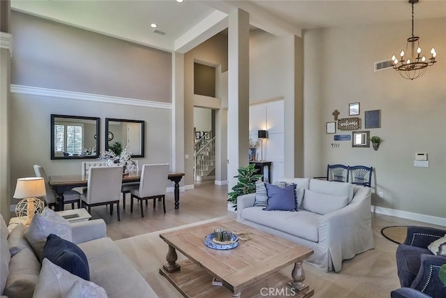 536 Granite Hills St, Simi Valley, CA 93065 - living area featuring high vaulted ceiling, a chandelier, stairway, baseboards, and beamed ceiling