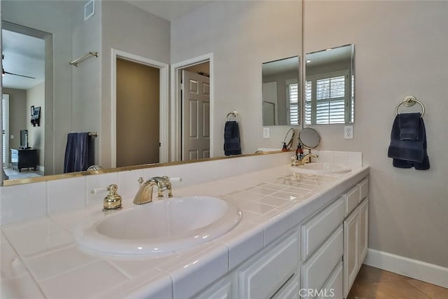 536 Granite Hills St, Simi Valley, CA 93065 - bathroom featuring baseboards, double vanity, and tile patterned flooring