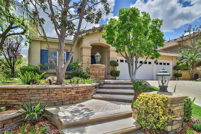 536 Granite Hills St, Simi Valley, CA 93065 - view of front facade featuring driveway, stucco siding, and a garage