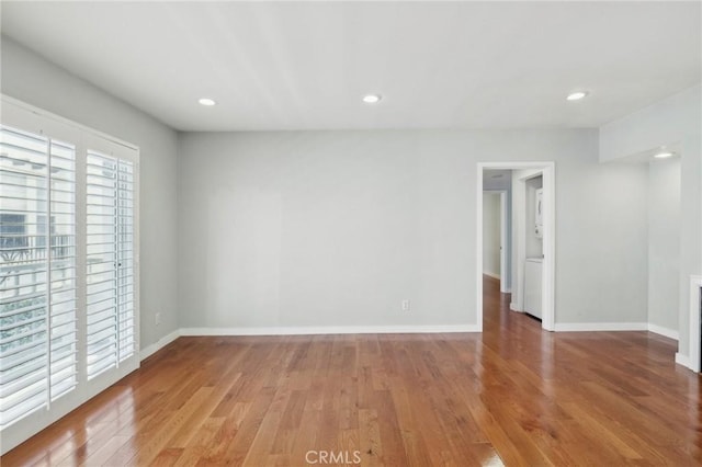 13220 Valleyheart Dr Unit 106, Studio City, CA 91604 - unfurnished room featuring wood finished floors, baseboards, and recessed lighting