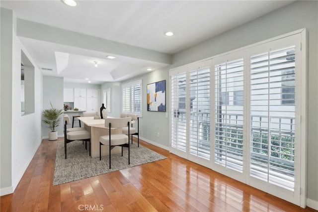 13220 Valleyheart Dr Unit 106, Studio City, CA 91604 - dining area with light wood-style flooring, baseboards, recessed lighting, and a raised ceiling