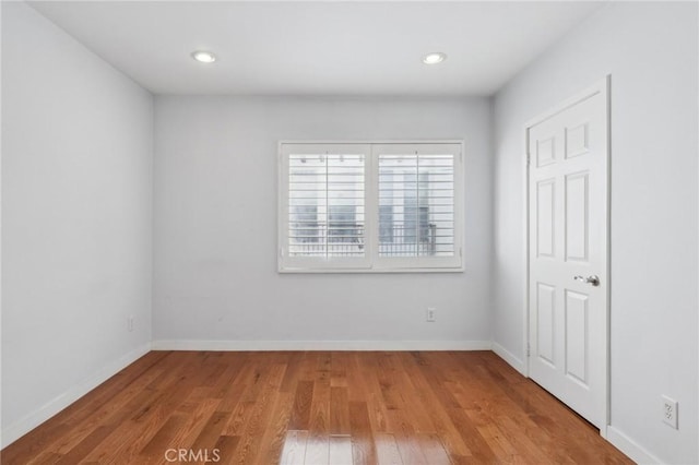 13220 Valleyheart Dr Unit 106, Studio City, CA 91604 - unfurnished bedroom featuring light wood-style flooring, baseboards, and recessed lighting
