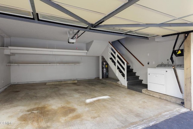 103 E Sierra Madre Blvd Unit E, Sierra Madre, CA 91024 - garage featuring washer and dryer, water heater, and a garage door opener